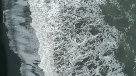 Waves-lapping-along-Iceland's-Black-Sand-Beach