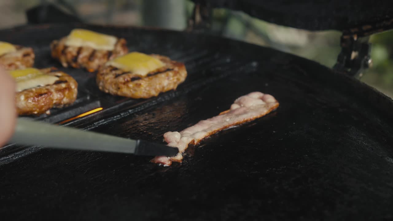 Cooking Burgers and Bacon on a Grill