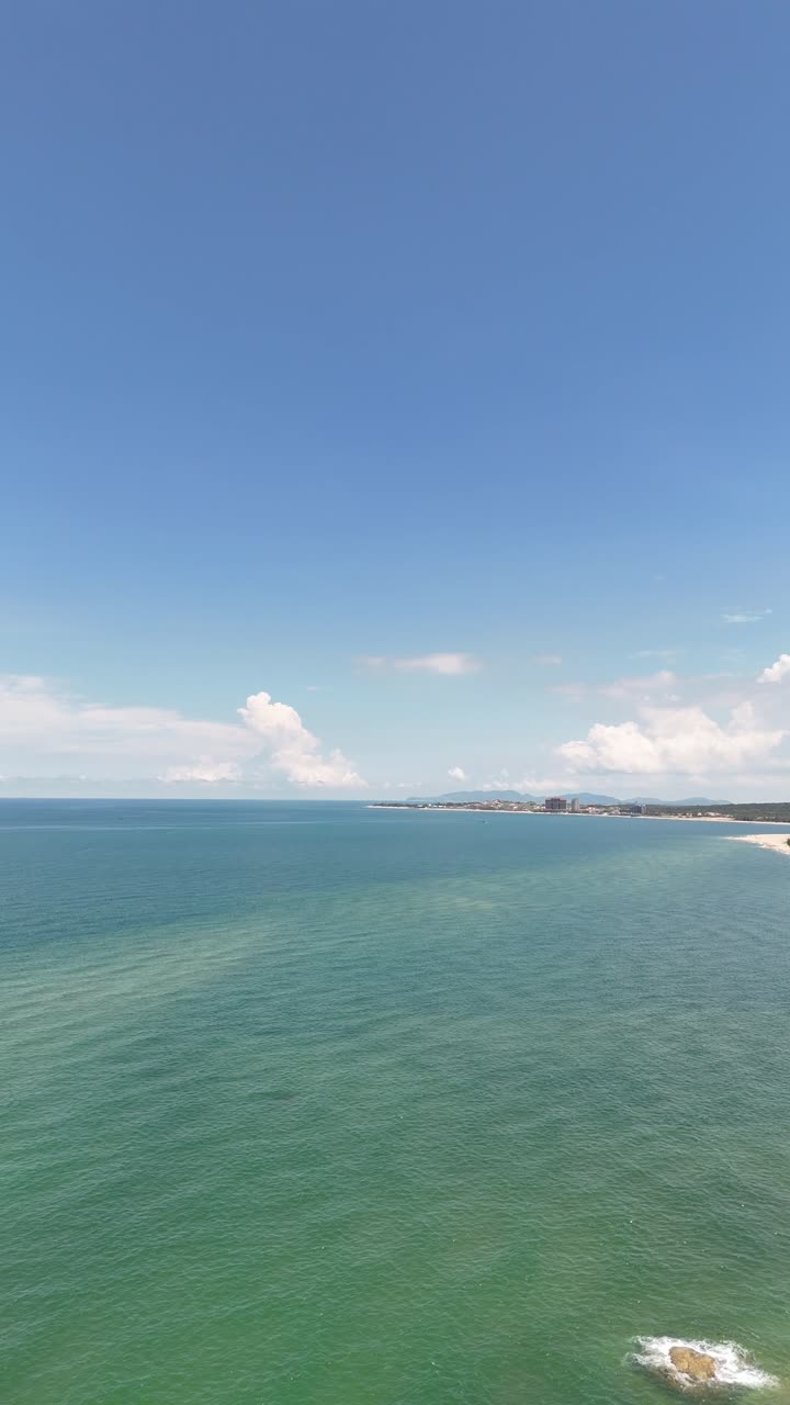 Aerial View Tilt of the Windy Coast in Ho Tram