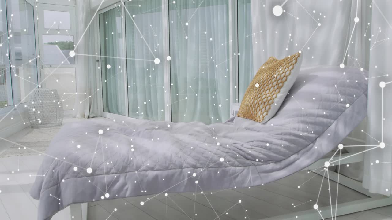 Letto bianco che raggiunge il secondo secondo con cuscino dorato che riceve barre fluttuanti del web che visualizzano la rete