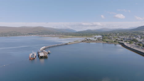 fort william aerial reveal shot above loch linnhe near old pier looking north