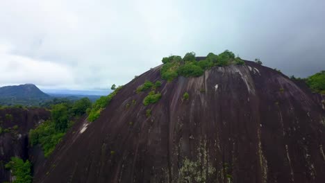 beautiful granite dome voltzberg mountain in suriname rainforest, aerial view