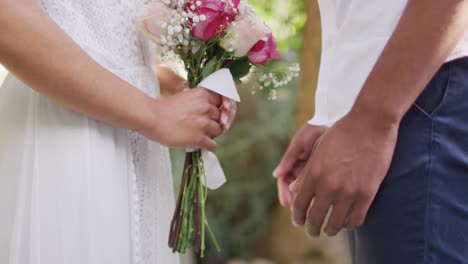 Close-up-of-married-african-american-couple-holding-hands