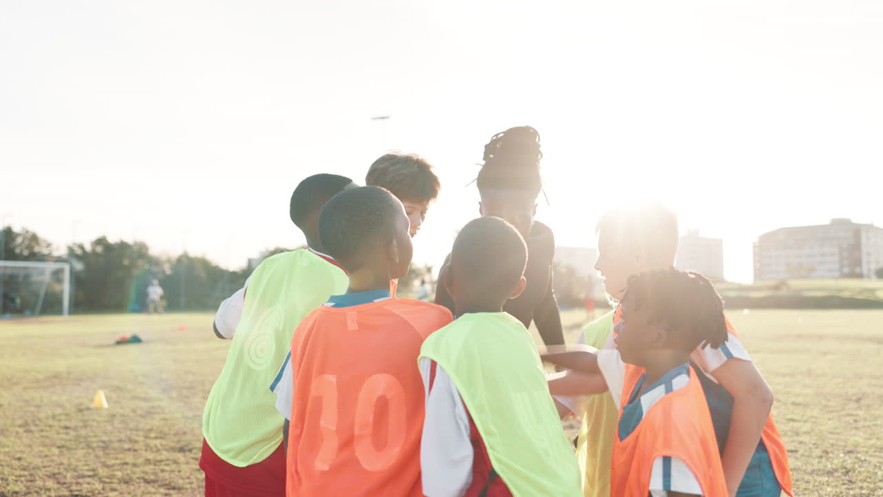 Soccer team celebrating on the field