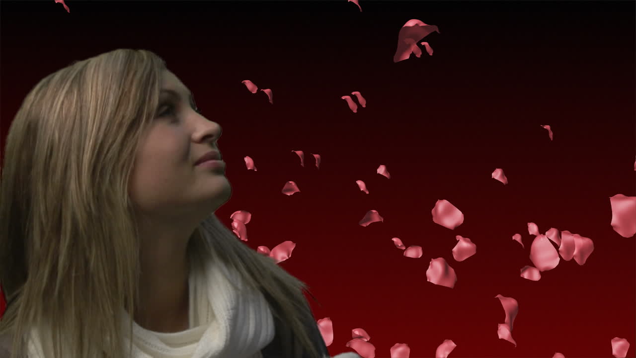 una mujer mirando a las rosas que caen 3