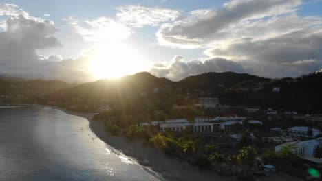 Sunset-on-a-tropical-beach,-Grenada-aerial