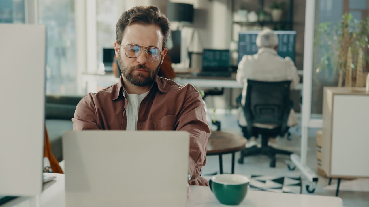 Stressed man in office