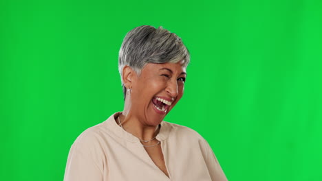 Wink,-green-screen-and-funny-mature-woman-laughing