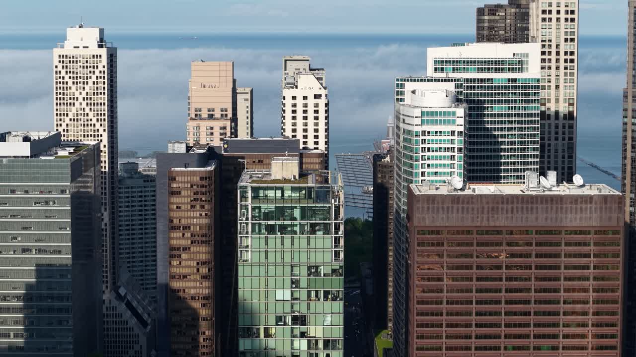 Aerial View of Chicago USA Downtown Skyscrapers and Towers With Fog Over Lake Michigan in Background