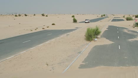 desert road with a car