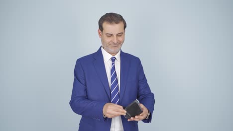 moneyless businessman. empty wallet.