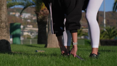 woman doing resistance band workout outdoors