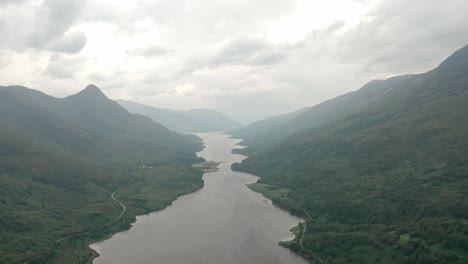 High-descending-drone-shot-over-Scottish-Loch