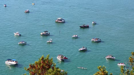 locals enjoy their watercraft on hot summer african day, heat shimmer