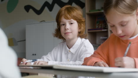 caucasian student looking at the camera.