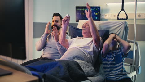 family supports grandfather in hospital