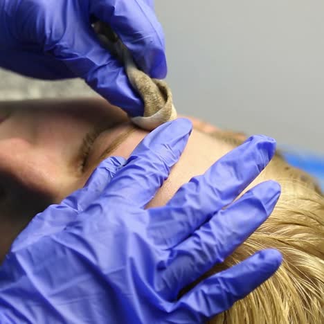 permanent tattooing of eyebrows