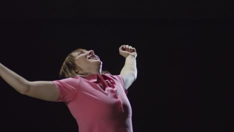female soccer player celebrating victory