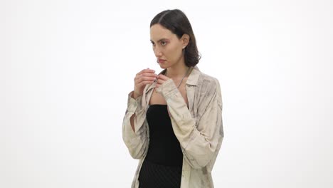 Studio portrait of a woman in fashion clothing