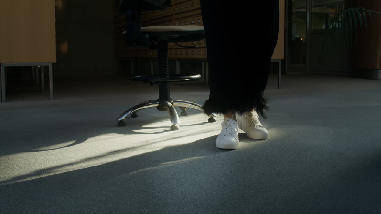 Low angle shot of legs in an office