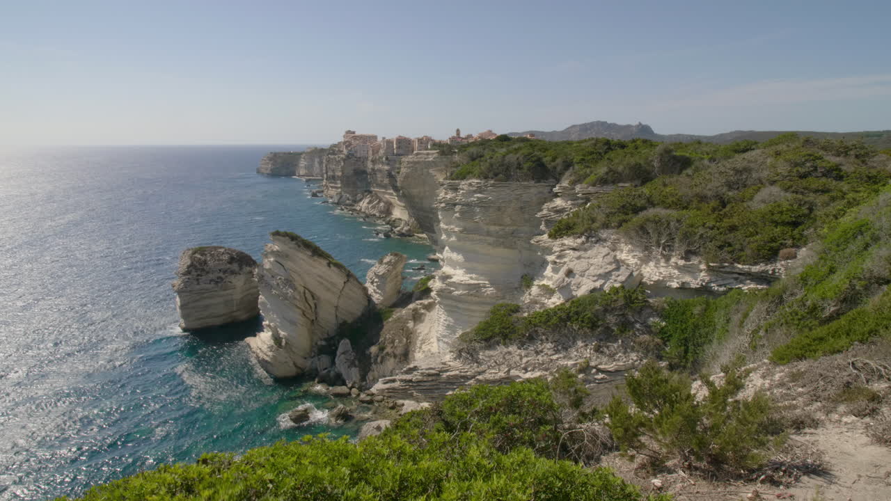 Bonifacio Corsica Cliffside Mediterranean Sea panorama with Historic old Town and Coastal limestone Landscape