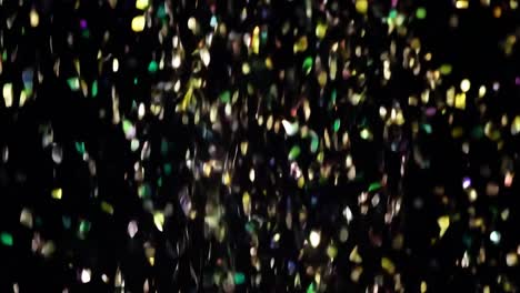 colorful confetti falling on black background