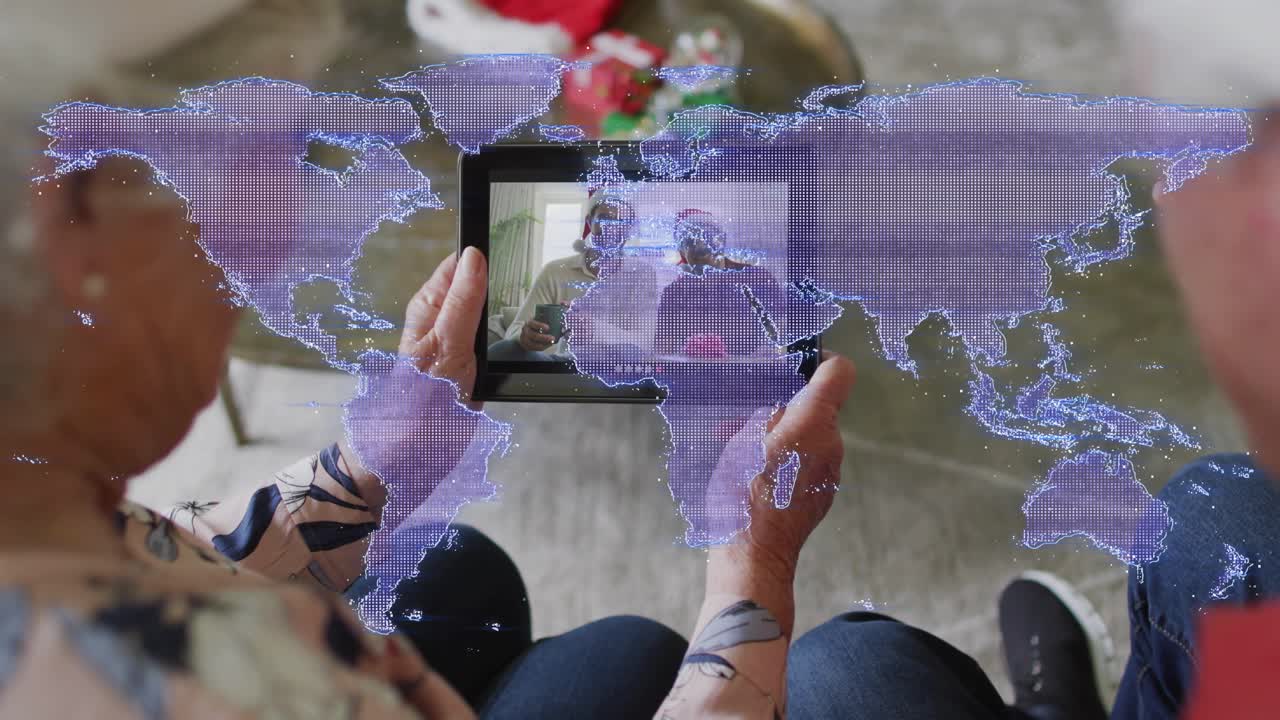 Couple sharing tablet, pulling and steadying as onscreen moving, viewing family via purple map tech