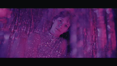 woman in a glittery purple dress