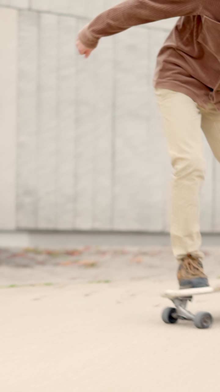 Lower part of a man in skateboard in a park