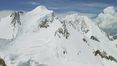 gorgeous alpine panorama, huge snow white belukha mt towering over highland vale