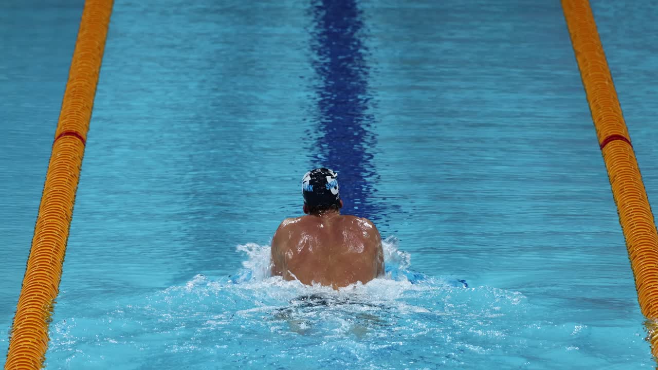 Athlete swimming laps in a competition pool