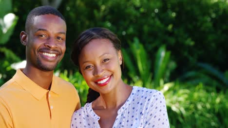 Portrait-of-cute-couple-posing-and-smiling