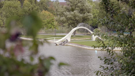 empty-waterslide-with-trees-in-forefront,-autumn,-Woog-Lake-Darmstadt,-Hessen,-Germany