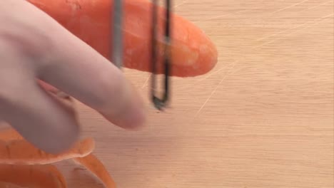 stock footage of a carrot being peeled