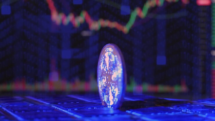 Una moneta di criptovaluta Cardano ADA che ruota su un impianto di mining di chip di computer con grafici di scambio sullo sfondo.