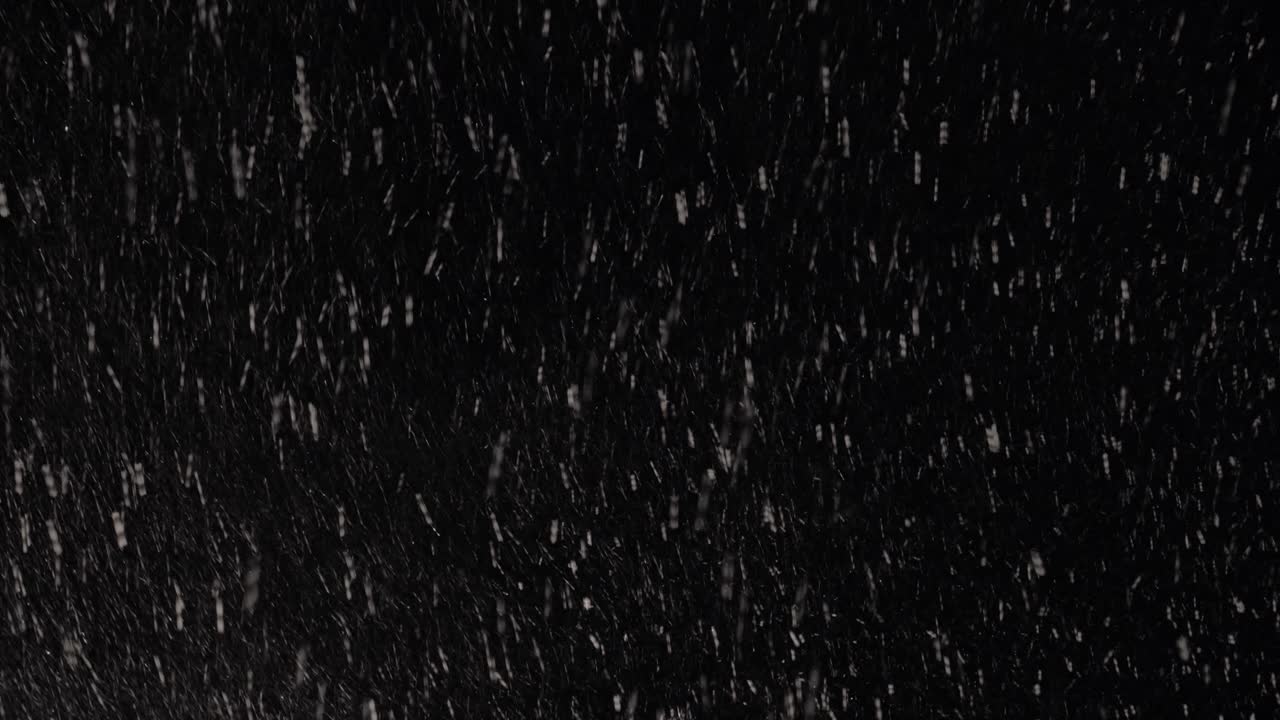 Snowstorm at black night