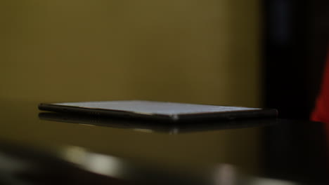 Woman signing in on a tablet device
