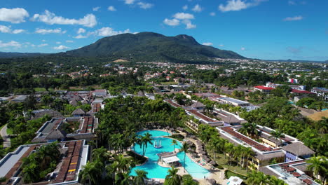 luxury resort hotel with swimming pool in puerto plata town, dominican republic