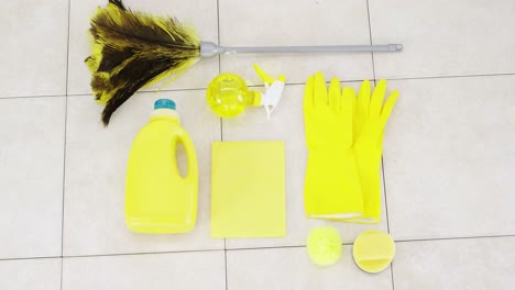 Yellow-rubber-gloves-and-cleaning-supplies