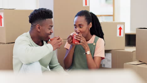 boxes, new home or black couple with coffee