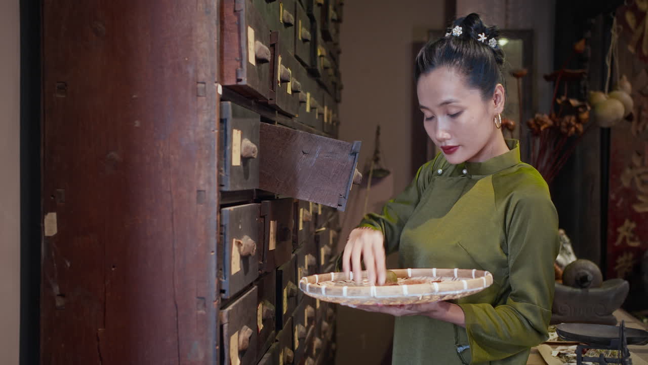 Female Alternative Medicine Practitioner Searching for Ingredients at Pharmacy