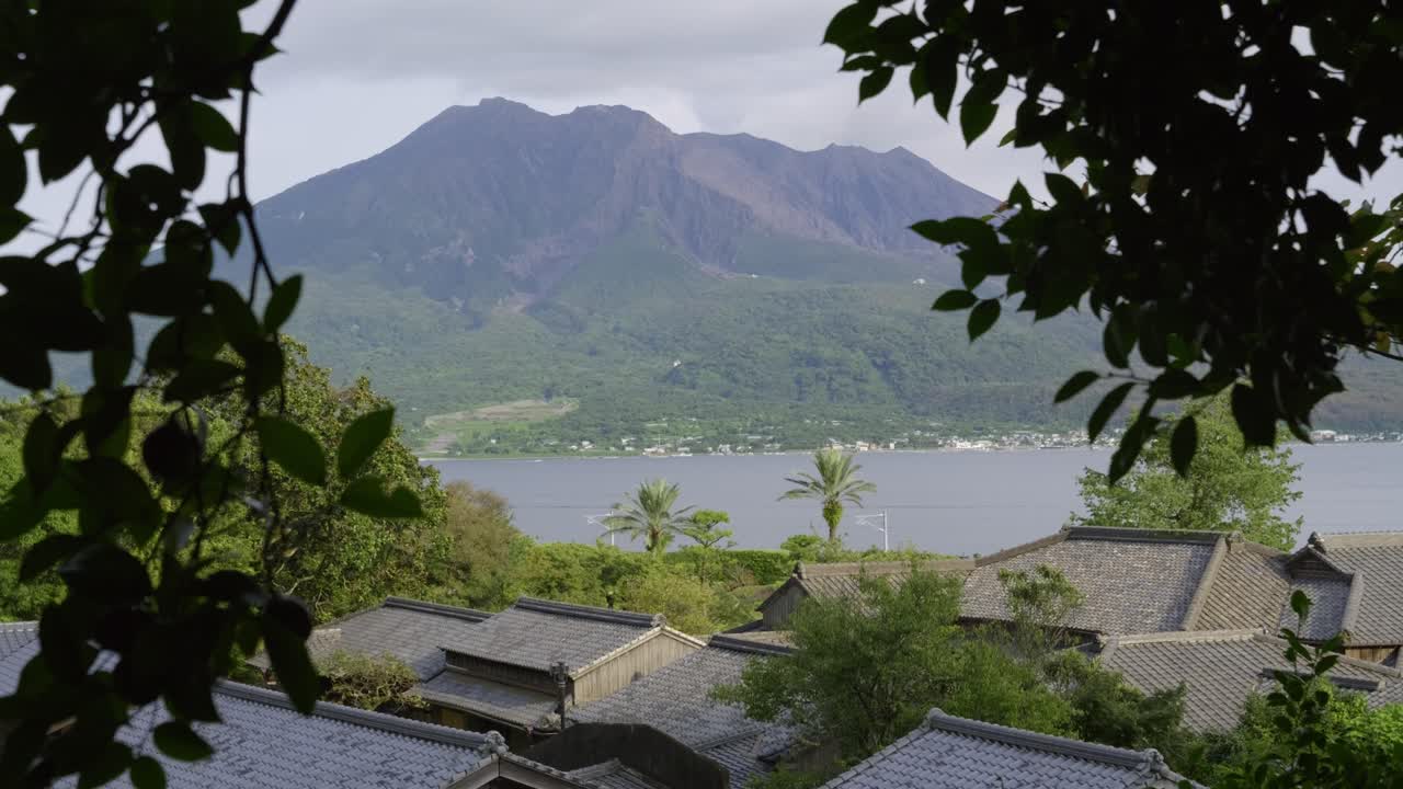 Famous Sangen-en landscape garden in Kagoshima with Sakurajima in distance