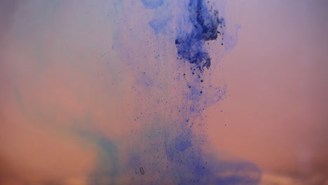 paint floating in water looking like majestic nebulas. stable shot with the sony a7iii.