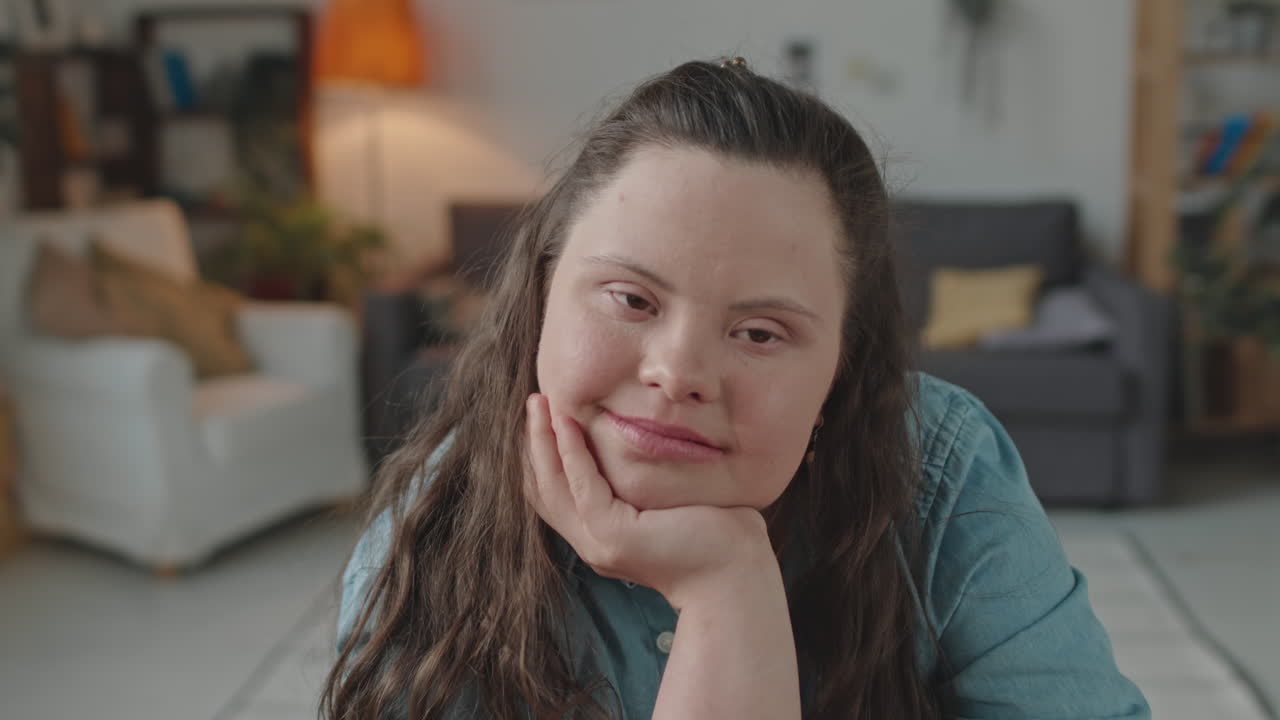 Portrait of a young woman with Down syndrome