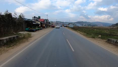 motorcycle rider view of city road landscape at day video is taken at dawki meghalaya north east india on july 06 2023