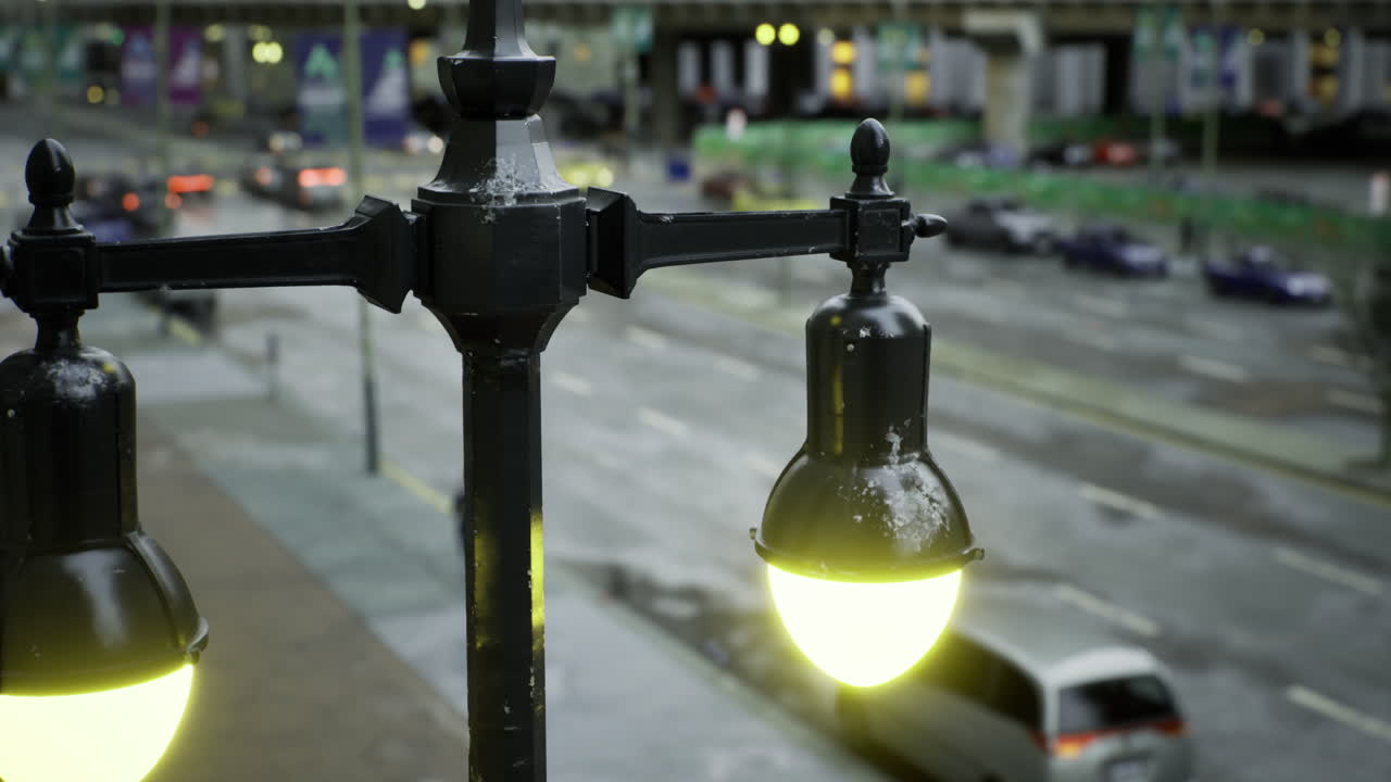 Vibrant streetlights illuminating a quiet cityscape during twilight hours