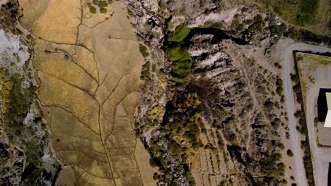 aerial view in the altiplano, sunny evening, putre, chile - top down, drone shot