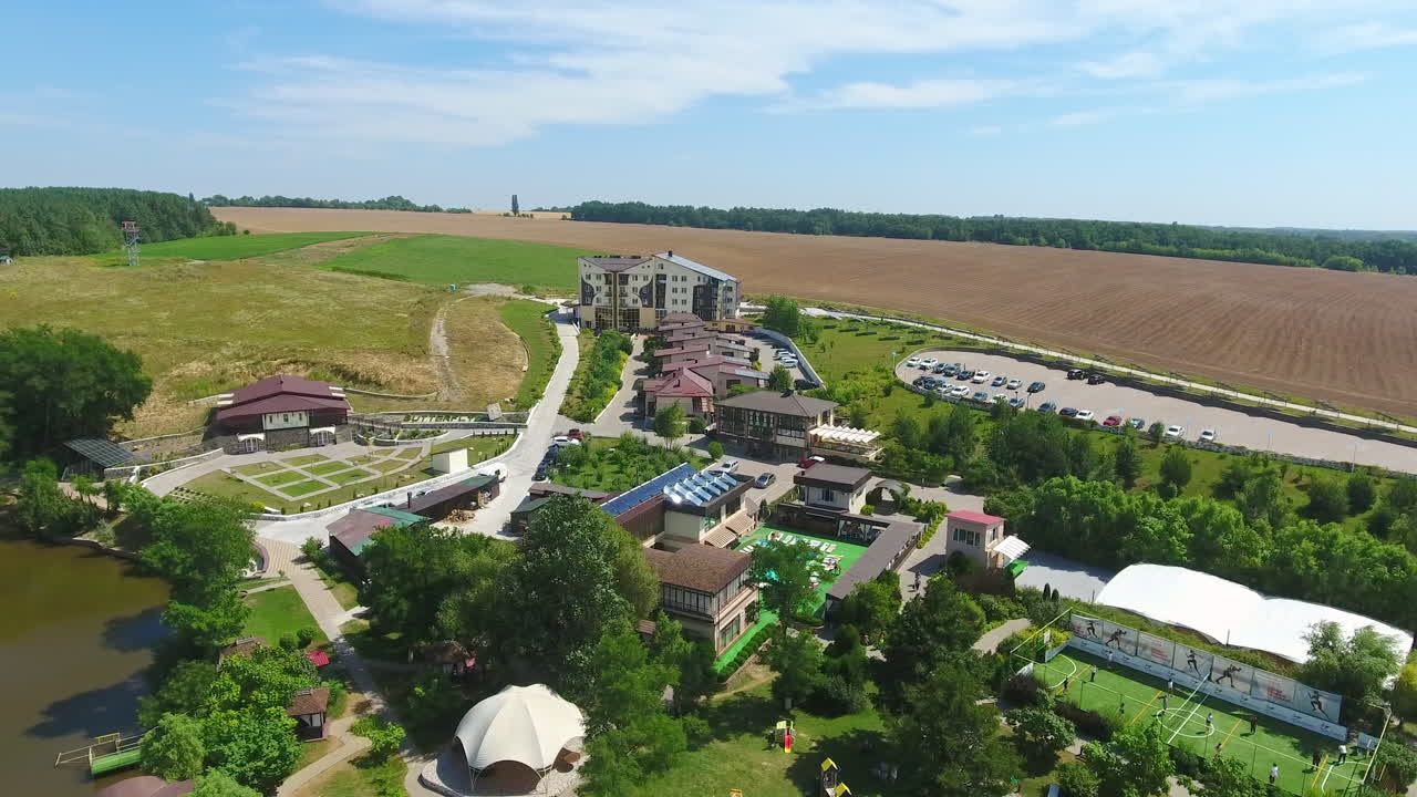 Nice and beautiful rural spa resort for comfortable rest and recreation. Well-kept green zone with pools, ponds and tennis courts. Drone footage.