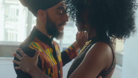 african-american woman dancing tango with partner in studio