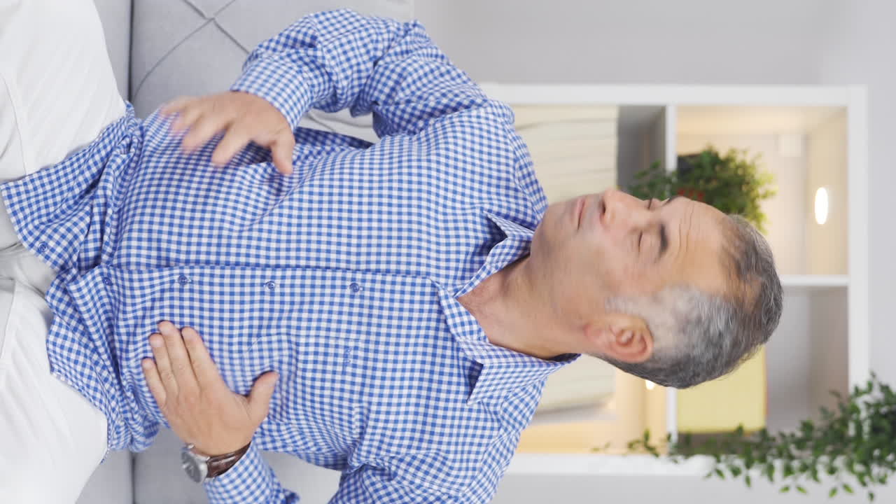 Vertical video of Portrait of man feeling excited.
